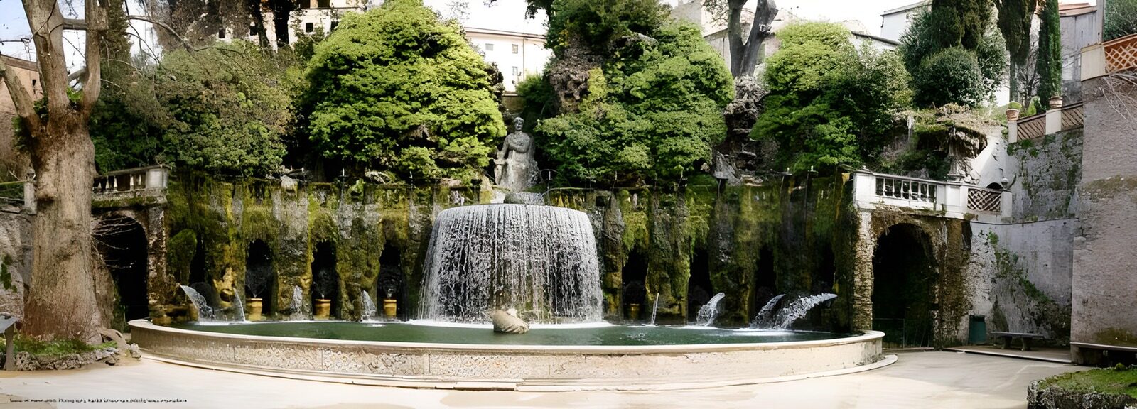 TPDE32300: künstlicher Wasserfall mit Laubengang in einem Park