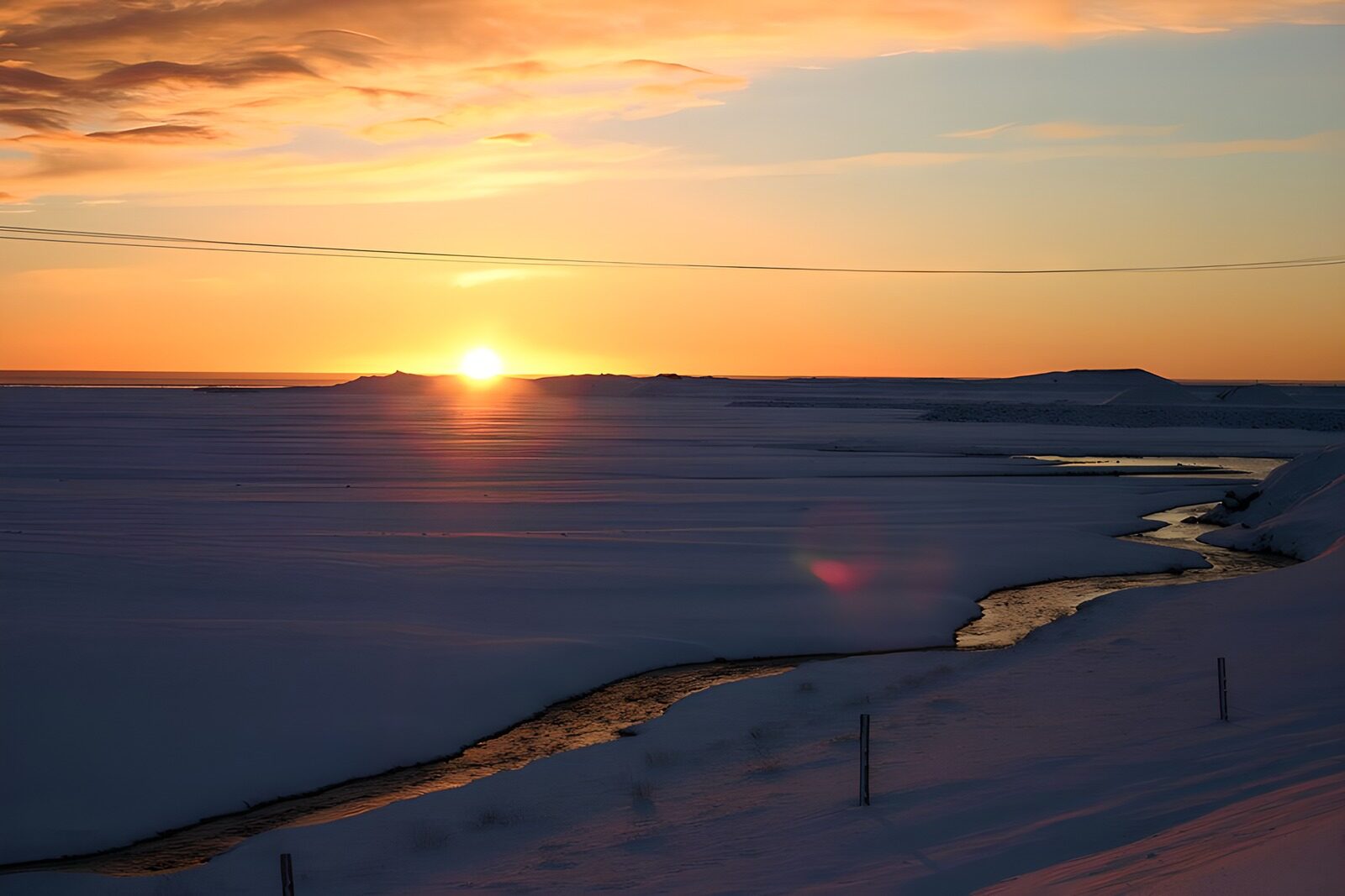 TPDE35528: verschneite Winterlandschaft bei Sonnenuntergang