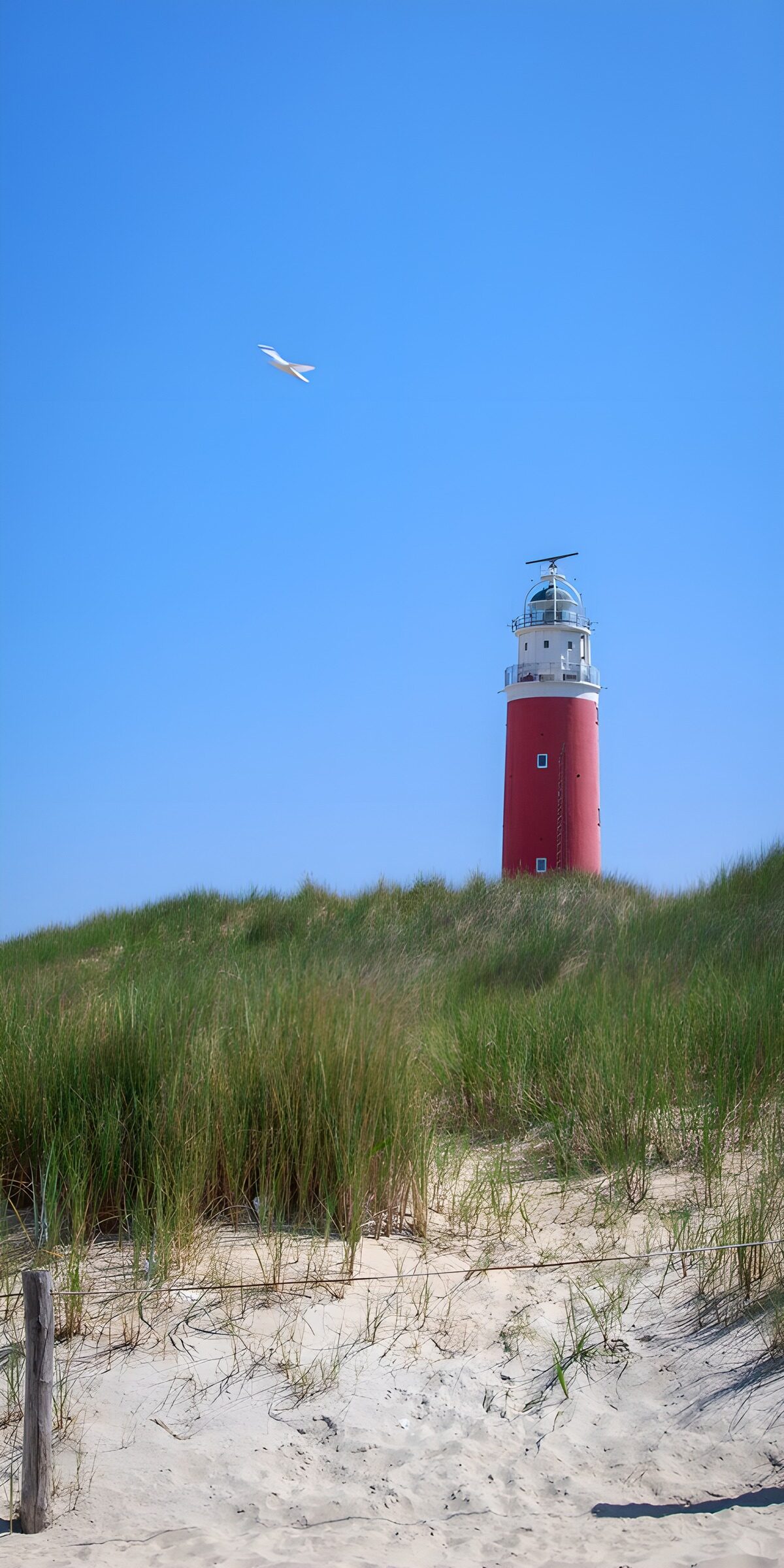 TPDE92809: Leuchtturm im Sand