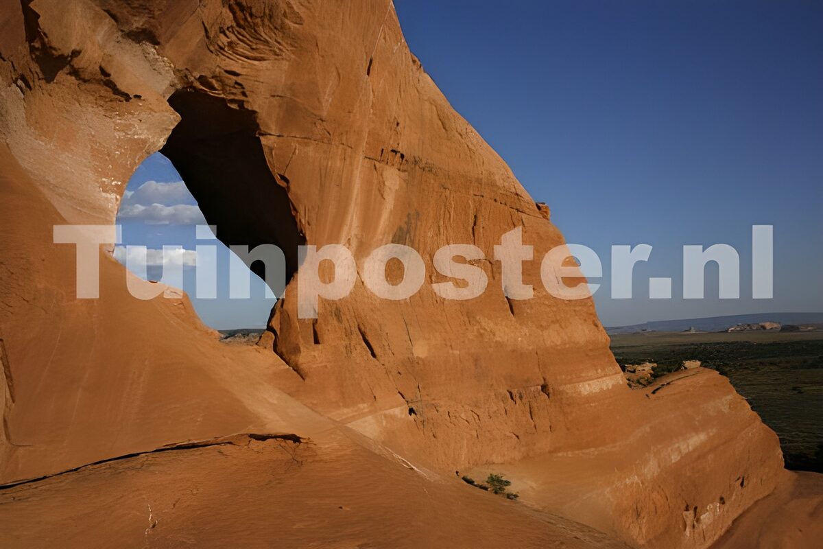 Sandsteinfelsen gen blauen Himmel