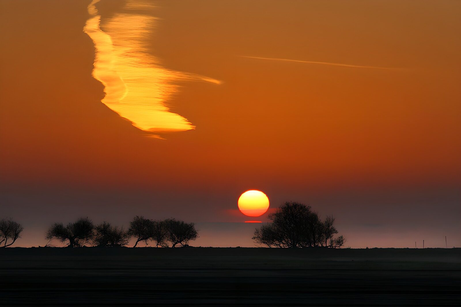 TPDE38742: Sonnenuntergang über dem Wasser