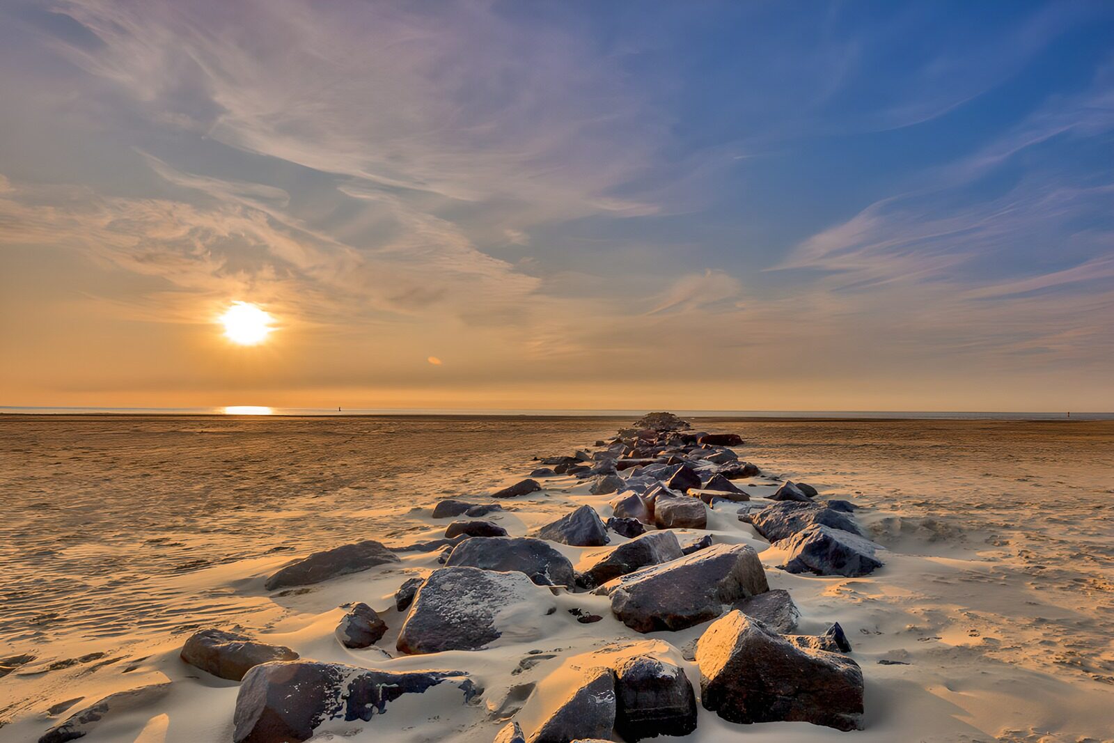 TPDE31385: Sonnenuntergang über den Küstensteinen
